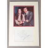 A mounted autograph display of Natalie Wood and Robert Wood. Height: 46cm, Width: 30cm.
