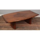 An Art Deco walnut coffee table. (146cm x 82cm) Some scratches and wear to the top.