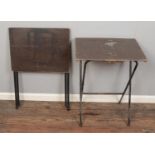 Two vintage folding school desks.
