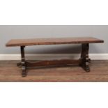 An oak coffee table/ bench. Made by Webber furniture (The Croydon Range)H: 38cm W: 106.5cm D: 35cm.