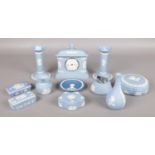 A quantity of Wedgwood Jasperware ceramics. To include a pair of candlesticks, Ronson desktop