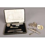 A selection of silver pieces. To include tooth brush, pill box, nail files, nail buffer and two