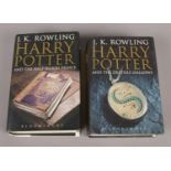 Two Harry Potter first edition books by J.K. Rowling. Harry Potter & the half blood prince & Harry