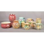A quantity of assorted ceramic's. Denby Vase and bowl, Crown Devon jugs, Bretby jugs 3431 etc