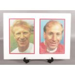 A mounted and signed display presentation of the Charlton Brothers - Jackie & Bobby. H:37cm W: 53.