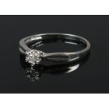 A 9ct white gold diamond solitaire ring. Diamond size 0.05ct. Size P. 1.22g.