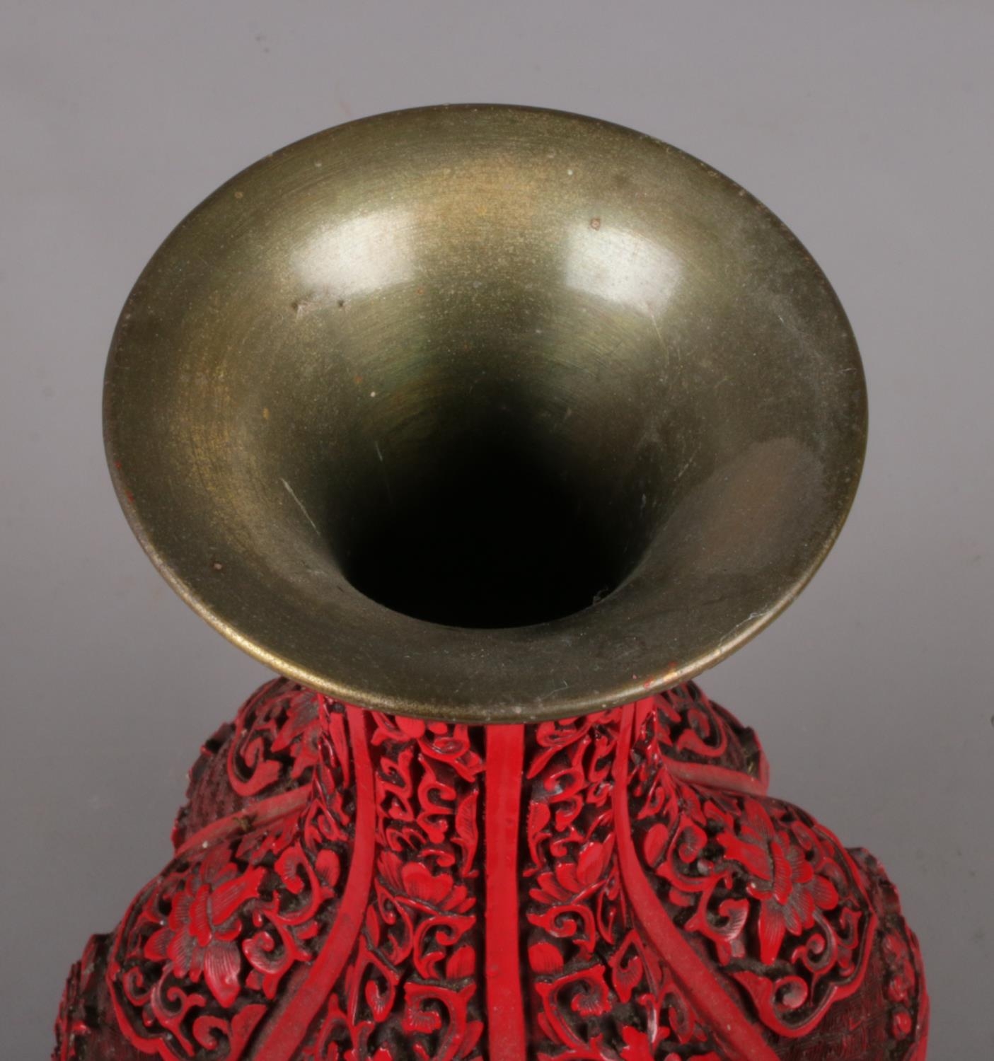 A Chinese cinnabar lacquer style fluted vase. 32cm. - Image 3 of 3