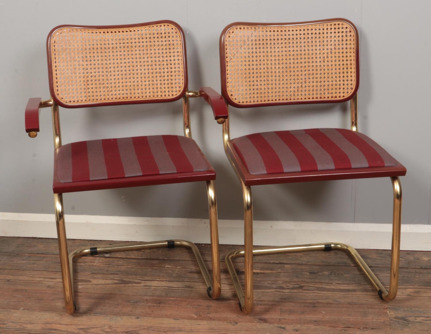 A set of six Marcel Breuer style Cesca chairs with brass coloured tubular frame and maroon striped - Image 2 of 2