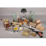 A quantity of collectables. Including commando knife, Military belt, Parker pens, glass bottles,