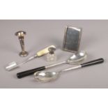 A small quantity of silver and silver mounted items. To include: Silver topped scent bottle,