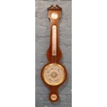A mahogany Rapport banjo barometer and hygrometer.