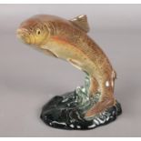 A ceramic Beswick figure of a leaping Trout. 1032. Minor chips to some fins.