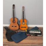 Two cased classical guitars (Young Adult- Encore ENC36N & Hohner HC-06 Adult), along with a boxed