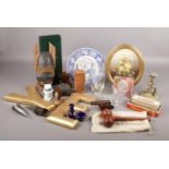 A box of miscellaneous. Includes tribal mask, Caithness, gilt display letters, Avon perfume