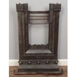 A small cast iron bedroom fireplace. Height: 90cm, Width: 65cm.