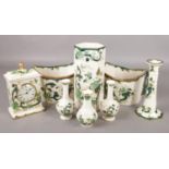 A collection of Masons Chartreuse pattern ceramics. Includes a pair of planters, vases, clock,