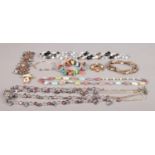 A small quantity of costume jewellery, containing polished and semi precious stones.