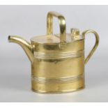 A solid brass watering can with banded design, by Joseph Sankey Sons. 25cm high.