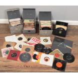Four carry cases of single records. Including Dusty Springfield, Beatles, Elvis, Roy Orbison,