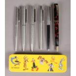 A selection of Parker pens. To include a Parker Duofold pen with 14ct gold nib. Comprising of a