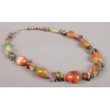A crystal and semi-precious stone necklace, with white metal clasp.