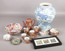 A collection of oriental ceramics and collectables. Includes large blue and white vase, cloisonné