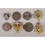 A collection of coins, medals and badges. To include a WWI wound badge, British Legion badge, NZ