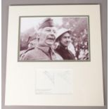 A large mounted display of Clive Dunn and Bill Pertwee; Dad's Army. Signed by both below photograph.