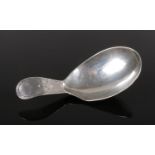 A George III silver caddy spoon. 6.4g.