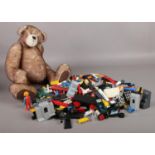 A quantity of Lego & a fully jointed 'oh that's nice' teddy bear.