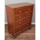 A Victorian mahogany chest of 2 over 3 drawers, with tiger stripe handles. Height: 126cm, Width: