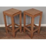 A pair of modern beech stools.