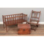Three pieces of treen. To include a child's crib, a child's folding chair with leather straps and