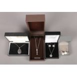 A small assortment of silver jewellery; to include earrings and necklace suite, locket inscribed "