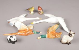 A selection of mostly Beswick ceramics. To include 980 Robin, 2105 Green Finch, Beswick flying