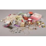 A quantity of costume jewellery. Beads, bangles, earrings etc