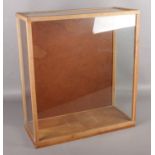 A glass and oak display box. (67cm x 60cm)