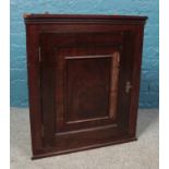 A mahogany corner cupboard, purportedly from Thrybergh Hall. Height: 72cm, Width: 64cm.