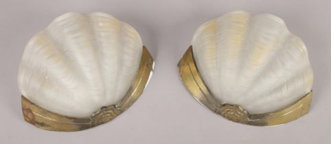 A pair of Art Deco wall lights formed as shells.