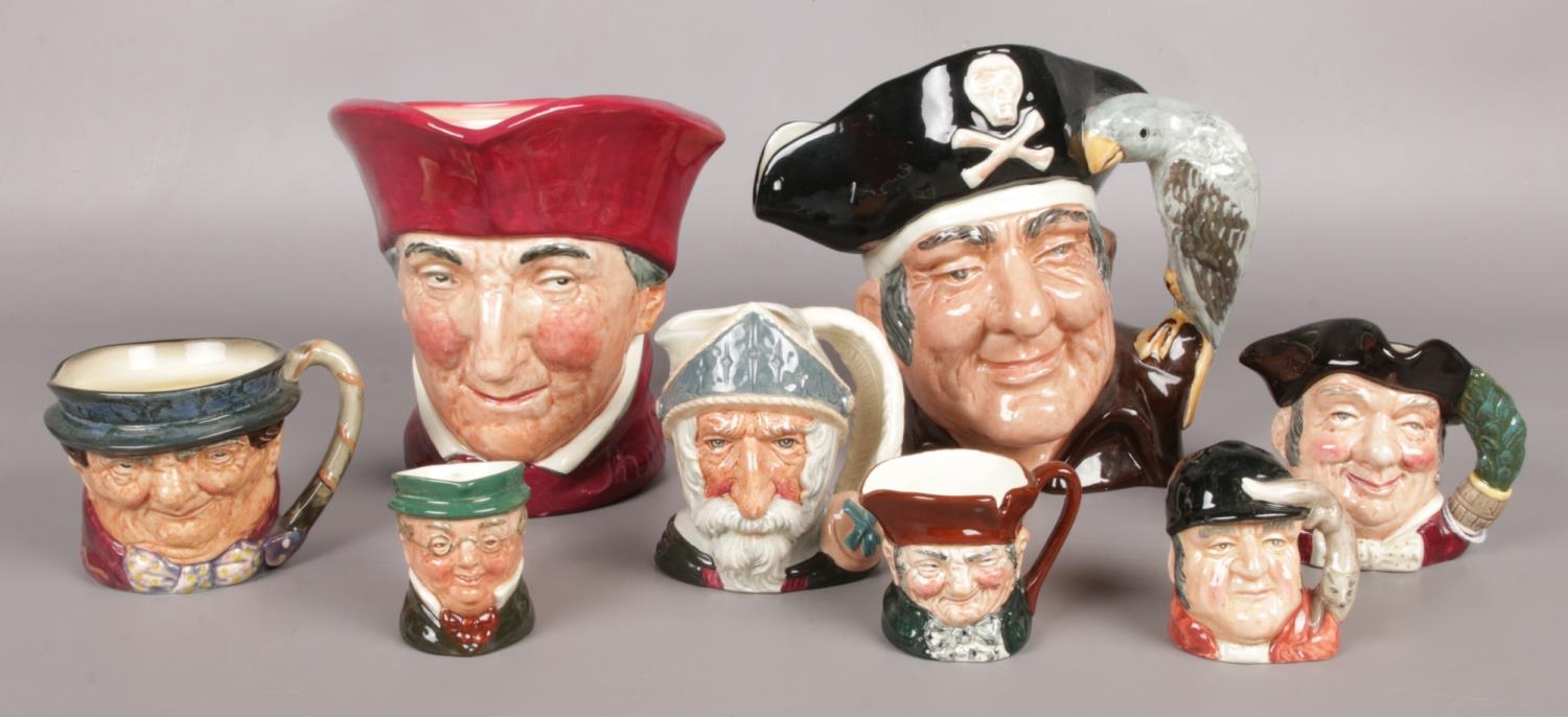 A collection of Royal Doulton character jugs, in various sizes. Includes large 'Long John