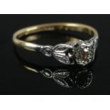 An 18ct Gold and Platinum diamond solitaire ring. Size of diamond approximately ¼ct. Size P. Total