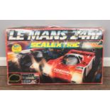 A boxed Scalextric 'Le Mans 24hr' set.