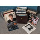 A quantity of vinyl LP records. John Lennon, Kate Bush, Rod Stewart etc