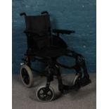 A Invacare action 2NG attendant wheelchair