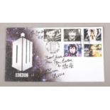 A first day cover of stamps depicting five actors who played Dr Who. Signed by Tom Baker (4th Dr