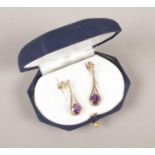 A pair of 9ct gold amethyst pendant earrings. 2.22g.