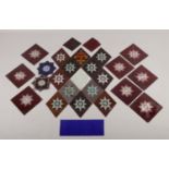 A collection of late Edwardian/early Victorian stained glass tiles, including Cobalt Blue and