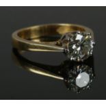 A 18ct gold moissanite ring, size J. 3.91g.