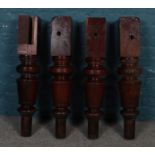 A set of four Mahogany snooker table legs. (92cm height 15cm width)