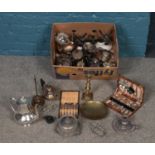 A box of metalwares. Including scales, coffee pot, vases, toast rack, brass candlestick, etc.